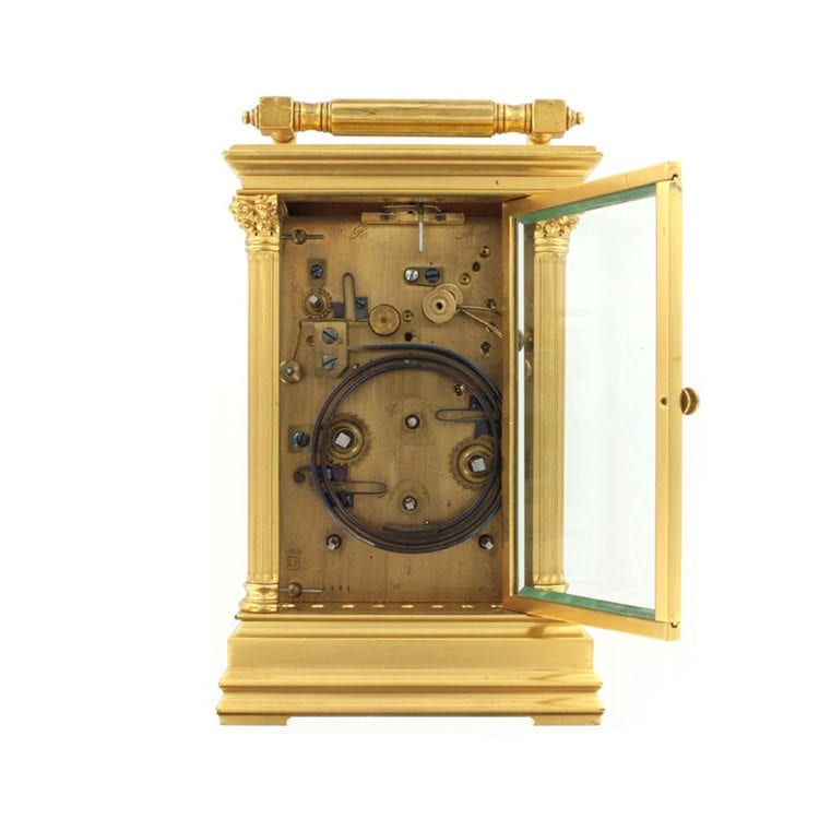 Antique gold clock open in product photography example
